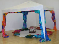 Home Made tent/gezeebo installation- featuring colourful silk drapes and cushions